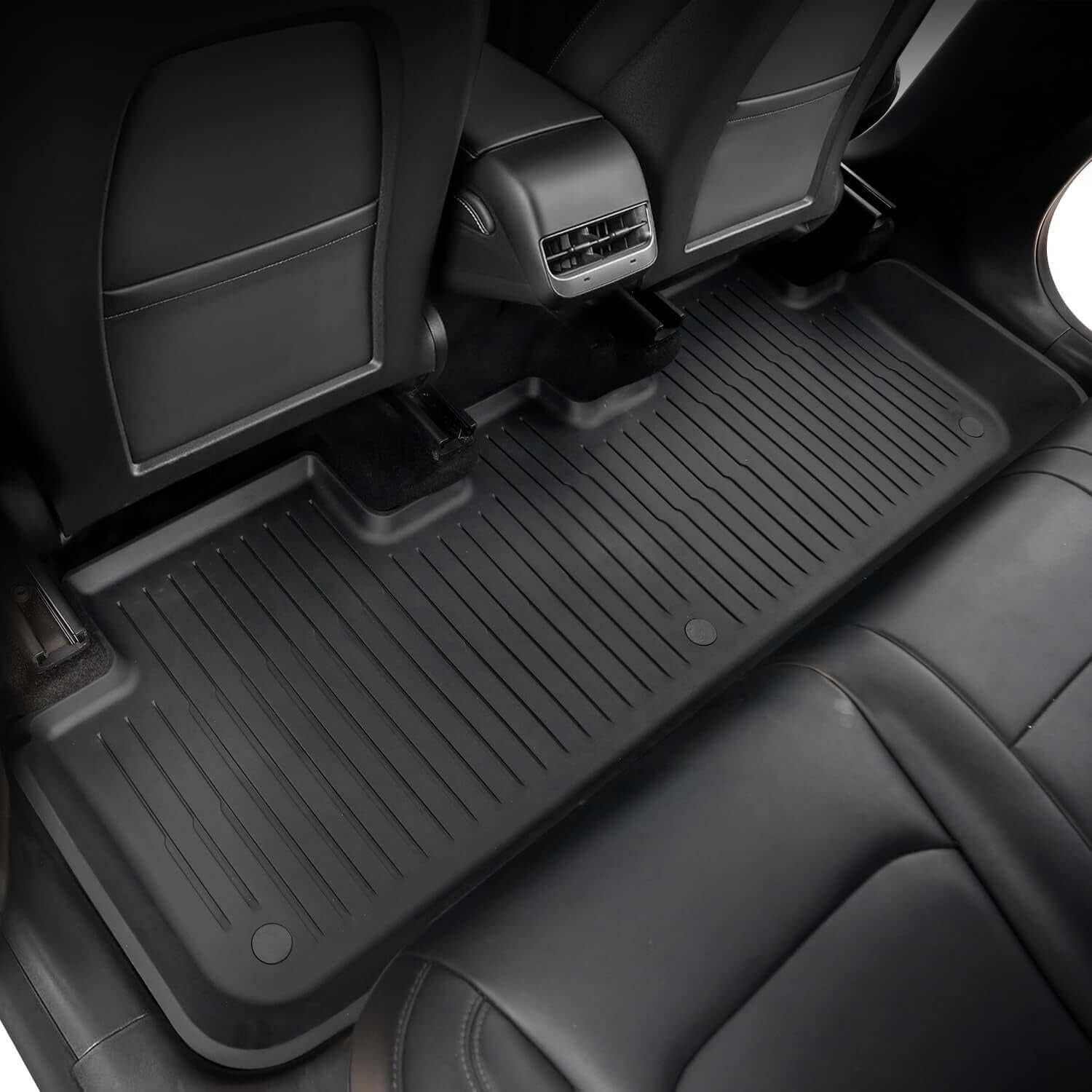 Precision-cut TPE all-weather mats for Tesla Model Y, featuring anti-slip texture and raised edges for spill containment