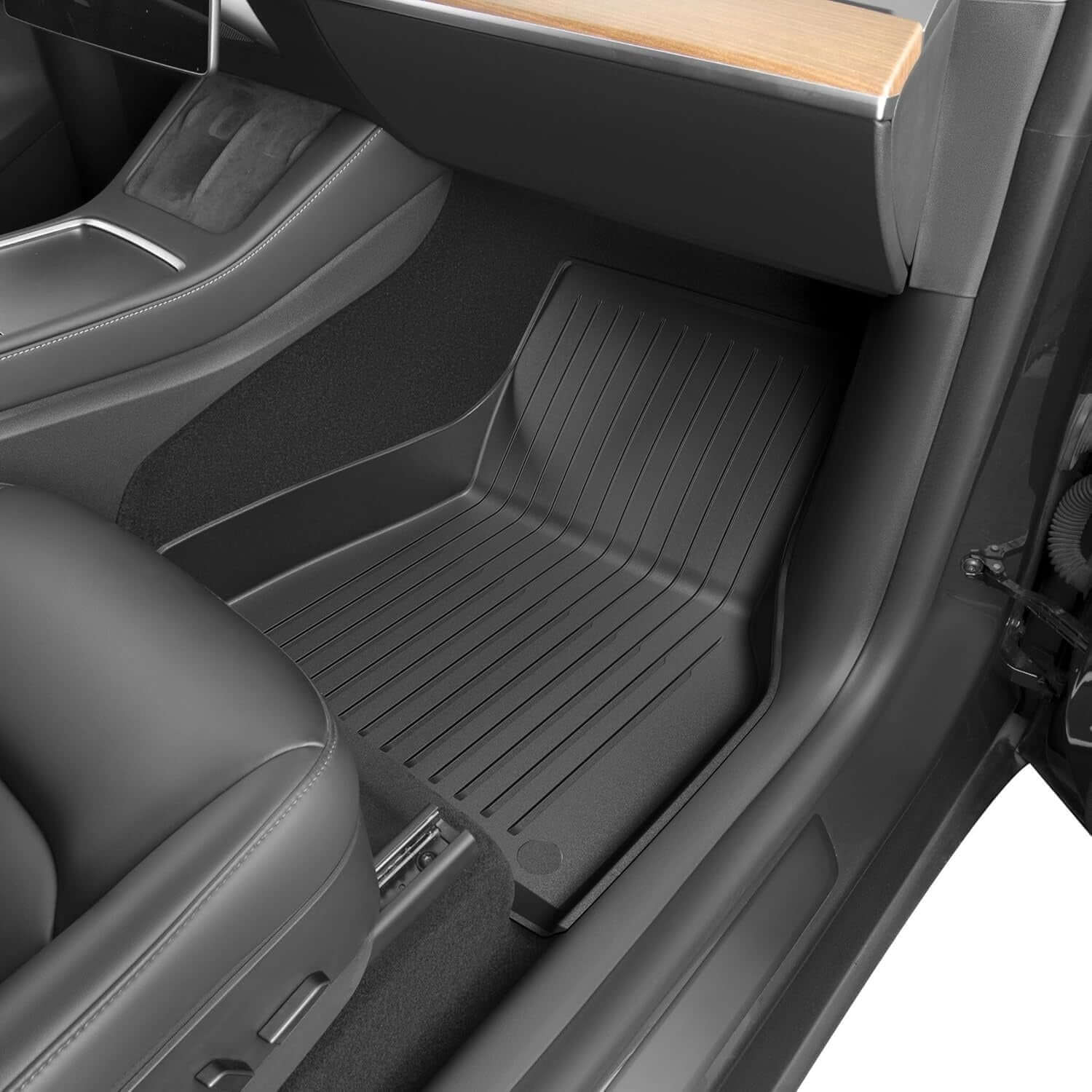 Custom-fit floor mats for Model Y footwells, providing full coverage and protection against mud and debris